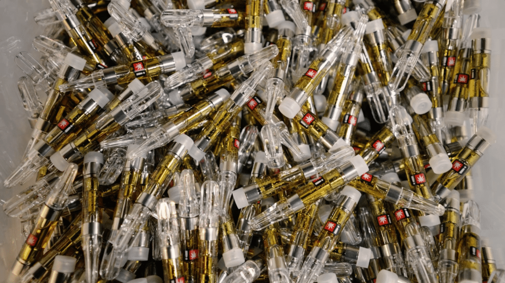 Filled vape cartridges waiting to be packaged.