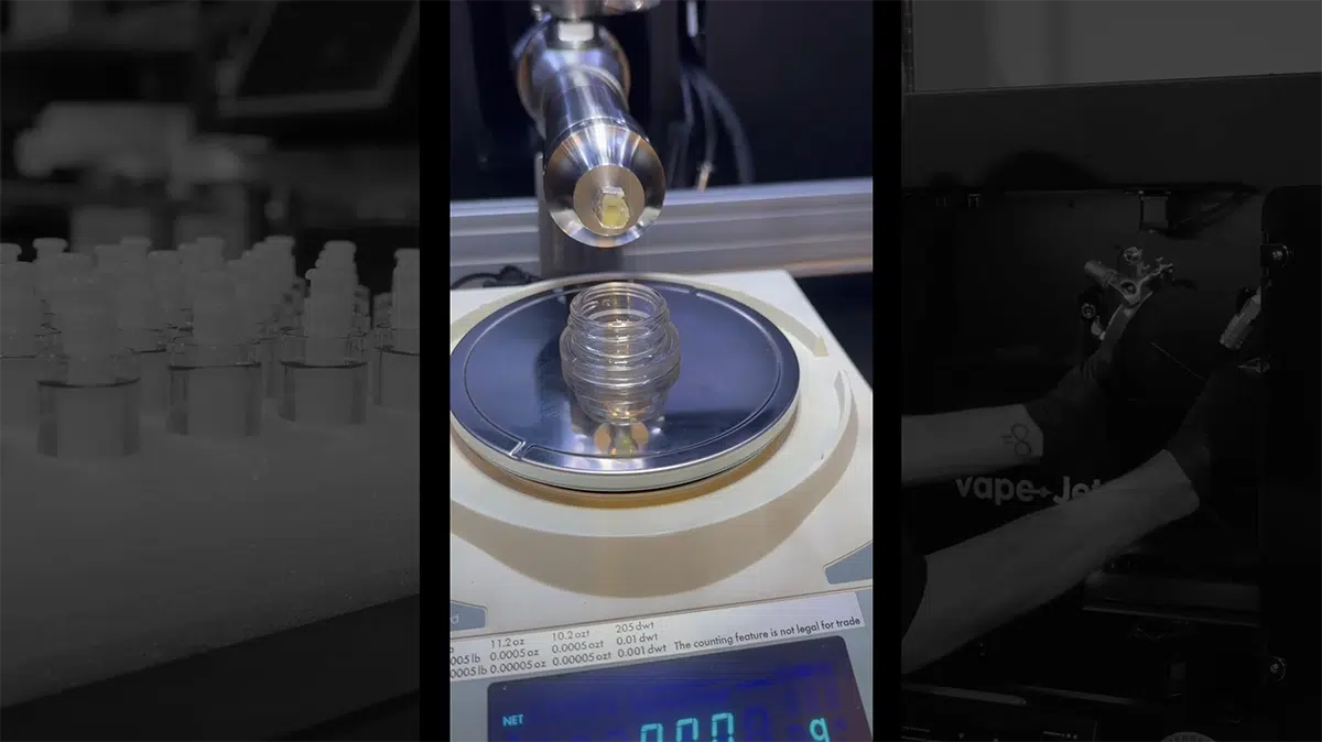 hold vape pen Semi-Automatic Cannabis Cartridge Filling Machine - Jet Fueler main image 1